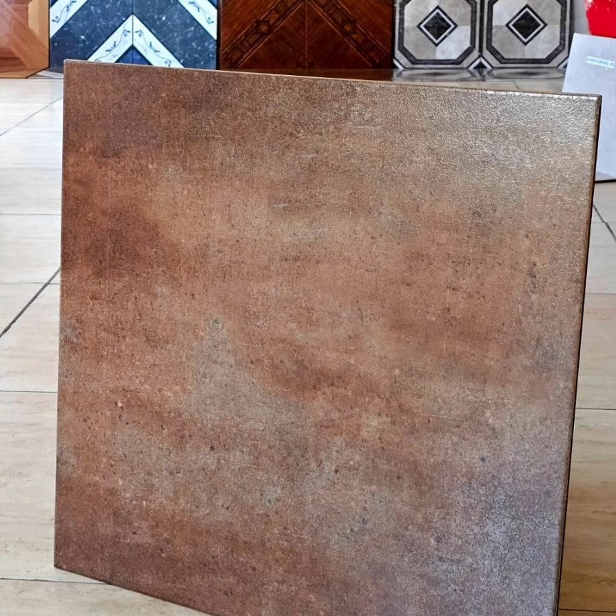 LOURDES COTTO CUERO 56X56CM (2.17M2) MATE